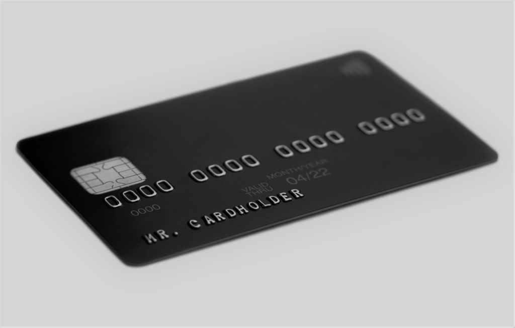 black universal bank card on white background cardholder